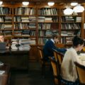 people sitting in a library