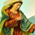 statue of virgin mary in colorful lighting
