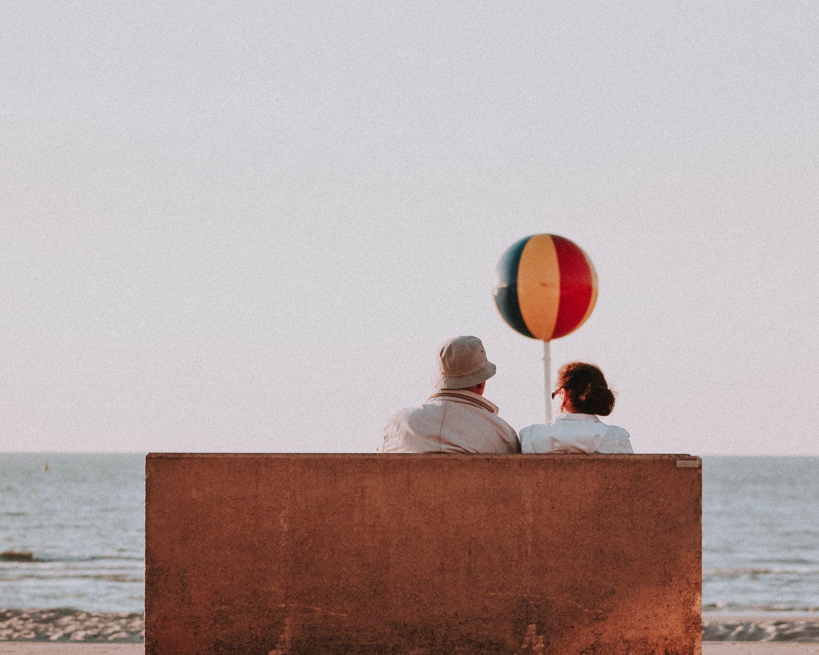elderly couple at seaside in summer